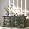 Green Entryway Cabinet Sideboard With Blue And White Vase Branches Books Decorative Items