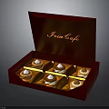 Open Red Box of Swiss Cafe Chocolates Arranged Neatly with Golden Lining and Cream Topping