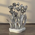 Colorful Floral Display With Red Yellow Purple Tulips In Unique Ceramic Pot On Wooden Table