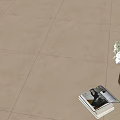 Light Colored Floor Tiles With White Flowers Vase And Stacked Magazines On Interior Floor