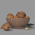 Wooden Bowl Filled With Walnuts And Chickpeas Beside Green Leaf On Gray Background