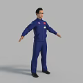 Man in Blue Jumpsuit with Badges Standing Arms Outstretched Full Body