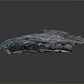Layered Geological Terrain With Blue Purple Brown Gray Textures And Folded Rock Structures