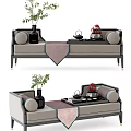Elegant Modern Daybed with Decorative Pillows Tea Set and Potted Plants