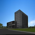 Tall Modern Office Building With Glass Curtain Wall Adjacent Low Structure And Green Lawn Surroundings