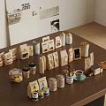 Café Wooden Table Display With Coffee Bags Cans Mugs Pastries And Decorative Prints