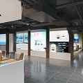Public Office Space With Central Waterfall Feature Green Plants Bookshelves Workstations And Modern Spacious Interior