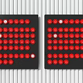 Two Black Control Panels With Red And White Circular Buttons Arrangement 3d model