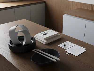 Minimalist Kitchen Table Decor With Black Bowl Chopsticks Silver Ornament And Books 3d model