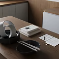 Minimalist Kitchen Table Decor With Black Bowl Chopsticks Silver Ornament And Books