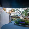 Modern Garden Landscape Design In Night Scene With Illuminated Trees And Water Feature