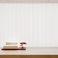 White Vertical Curtains in Modern Interior with White Sofa and Red Flowers on Wooden Tray