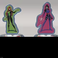 Two Colorful Anime Character Standee Displays With Illuminated Silver Bases