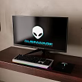 Alienware Gaming Monitor With RGB Keyboard On Modern Wooden Desk Setup