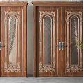 Wooden Swing Doors With Carved Details And Glass Panels For Home Interior