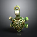 Green Turtle Shaped Decorative Ornament With Intricate Pattern And Hanging Loop