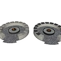 Outdoor Circular Fire Pit With Black Frame And Gray Pebbles For Garden Decor