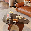 Black Glass Coffee Table With Wooden Legs Vase Pink Flower Vintage Camera Open Book