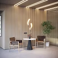 Modern Leisure Area Featuring Two Chairs Round Table Vase Green Plant And Wooden Slat Wall