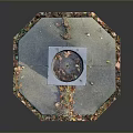 Outdoor Square Stone Fountain On Hexagonal Base Surrounded By Fallen Leaves