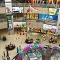 Vibrant Department Store Shopping Mall Interior With Colorful Balloons Streamers Stores And Shoppers
