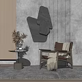 Stylish Accent Chair with Wooden Frame Small Table Mugs Potted Plant and Abstract Wall Decor