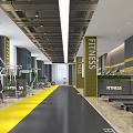 Modern Fitness Gym Interior With Spin Bikes Yellow Gray Striped Walls And Seating Area