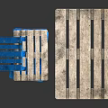 Wooden Pallets In Blue And Natural Color Stacked On Dark Surface