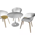 Modern Round Table and Chair Set with Colorful Upholstered Seats and Wooden Legs