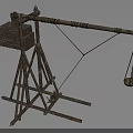 Medieval Wooden Catapult Weapon With Long Arm Frame And Stone Sling For Ancient Siege Warfare