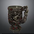 Decorative Silver Cup With Carved Female Figure And Red Gemstones Accents