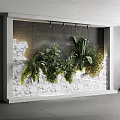 Indoor Living Wall With Various Hanging Green Plants And Natural Gray White Textured Design