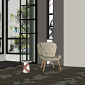 Modern Interior Space Featuring White Tufted Chair Wooden Stool And Glass Door Design