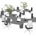 Modern Office Desk Arrangement In Open Workspace With Laptops Chairs And Green Plants