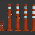 Set Of Orange Traffic Cones With White Reflective Stripes Standing And Fallen