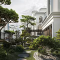 Classic Detached Villa Featuring Tall Tower Large Glass Windows and Green Surroundings