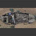 Weathered Wooden Boat Model Displayed On Sand Base With Small Green Plants
