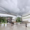 Cultural Center Modern Curved Architecture With Interior Greenery Open Space And Visitors