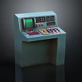 Vintage Blue Industrial Control Console Featuring Green Display Screen And Various Control Buttons And Knobs