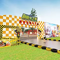 Fun Kids Go Kart Track With Checkerboard Fence And Tire Barriers On Grass Lawn