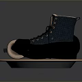 Black And Blue Lace Up Boots With Light Lining On Round Metal Edge Tray