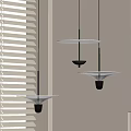 Modern Three Minimalist Pendant Lights With Sleek White Shades And Black Metal Frames