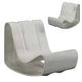 Modern Leisure Chair With Smooth Curved Design And White Surface For Home Interior