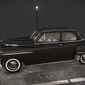 Vintage Black Classic Car Display With Street Lamp On Circular Wet Paved Ground