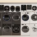 Various Styles of Modern Front Loading Washing Machines in Black and White Design