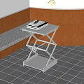 Wheeled Metal Side Table With Adjustable Frame And Stacked Books Near Wooden Wall