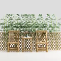 Two Outdoor Chairs with Small Table and Bamboo Plants Behind Lattice Fence