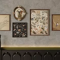 Artistic Wall Decor Collection With Various Framed Paintings And Patterns