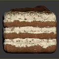 Layered Square Shaped Cake With Cream Layers Chocolate Shavings And Cocoa Powder