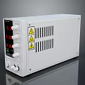 White Electronic Device With Digital Display Knobs Ventilation Slots And Warning Labels